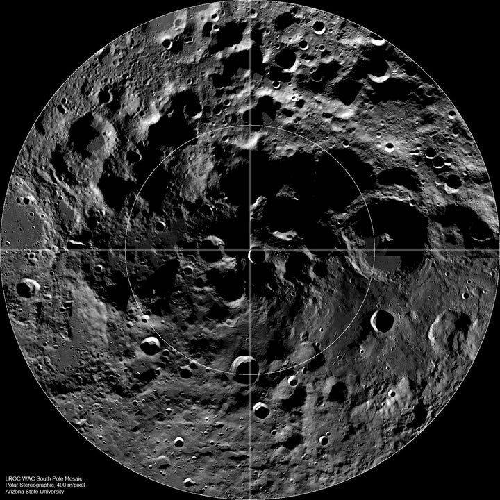 NASA image of the lunar south pole showing craters and permanent shadow regions